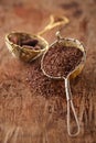 hot chocolate flakes with chilli flavor in old rustic style silver sieve Royalty Free Stock Photo