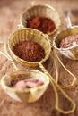 hot chocolate flakes with chilli flavor in old rustic style silver sieve Royalty Free Stock Photo