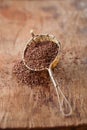 hot chocolate flakes with chilli flavor in old rustic style silver sieve Royalty Free Stock Photo