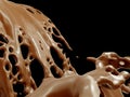 Hot chocolate flow or cocoa isolated on black Royalty Free Stock Photo