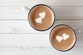 Hot chocolate with heart marshmallows over white wood Royalty Free Stock Photo