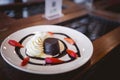 hot chocolate lava cake with vanilla ice cream and fresh strawberry Royalty Free Stock Photo