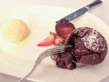 Hot chocolate pudding with fondant centre, close-up Royalty Free Stock Photo