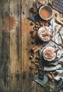 Hot chocolate with whipped cream, nuts, spices and cocoa powder Royalty Free Stock Photo