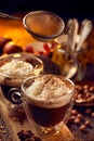 Hot chocolate with whipped cream sprinkled with cinnamon Royalty Free Stock Photo