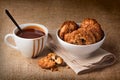 Hot chocolate in white cup and oatmeal cookies