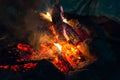 hot coals in a campfire near the tent