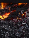 Hot coals, fire and flames close up photo.Burning charcoal for a barbecue Royalty Free Stock Photo