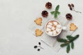 Hot cocoa or chocolate with marshmallow and cookies on white table from above. Traditional winter drink. Flat lay.