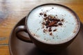 Hot cocoa with frothed milk in ceramic cup Royalty Free Stock Photo