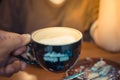 Hot Coffee in black cup Royalty Free Stock Photo