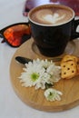 Hot coffee in black cup. Royalty Free Stock Photo