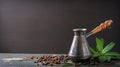 Hot coffee in a coffeepot or turk on a wooden background Royalty Free Stock Photo