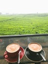 Hot coffee in the cold weather with an authentic view