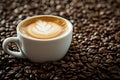 Hot coffee cup on coffee beans Royalty Free Stock Photo