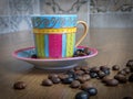 Hot Coffee in Coffee Cup with Saucer and coffee beans on Wooden Table Royalty Free Stock Photo