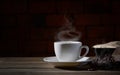 Hot coffee cup with smoke and coffee bean Royalty Free Stock Photo