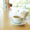 Hot of coffee drink on wooden table bar Royalty Free Stock Photo