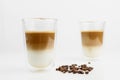 Hot Coffee Drinks With Milk With Coffee Beans Royalty Free Stock Photo