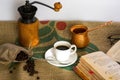 Hot coffee, glasses, fountain pen, book and coffee beans on a Coffee Gunny Sack Royalty Free Stock Photo