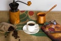 Hot coffee, glasses, fountain pen, book and coffee beans on a Coffee Gunny Sack Royalty Free Stock Photo