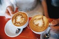 Hot coffee in the hands of a loving couple. Royalty Free Stock Photo