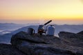 Hot coffee high in the mountains. Preparing coffee with gas camping stove Royalty Free Stock Photo