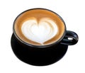 Hot coffee latte art heart shape foam in black ceramic cup isolated on white background, clipping path included Royalty Free Stock Photo