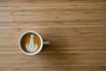 Hot coffee latte serving on wooden table Royalty Free Stock Photo