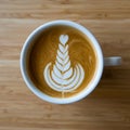 Hot coffee latte serving on wooden table Royalty Free Stock Photo