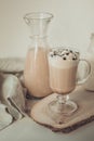 Hot coffee latte with thick foam and grated chocolate. Vintage. Royalty Free Stock Photo