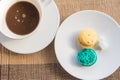 Hot coffee and macarons Royalty Free Stock Photo