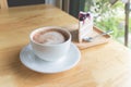 hot coffee mocha with foam milk and blueberry cake Royalty Free Stock Photo