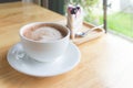 hot coffee mocha with foam milk and blueberry cake Royalty Free Stock Photo