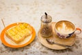 hot coffee mocha latte in white mug and bread on wood background Royalty Free Stock Photo