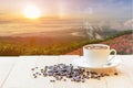 Hot coffee with nice view landscape in sunrise time Royalty Free Stock Photo