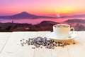 Hot coffee with sunrise at mountain Royalty Free Stock Photo