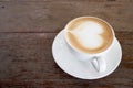 Hot coffee on table with heart shape on top of white cup. Copy space Royalty Free Stock Photo