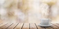 A hot coffee on the table on a spring background Royalty Free Stock Photo