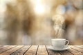 Hot coffee on the table on a winter background Royalty Free Stock Photo