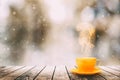 Hot coffee on the table on a winter background Royalty Free Stock Photo