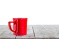 Hot coffee with white smoke in red cup on wood table Royalty Free Stock Photo