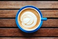 Hot coffee on wooden background