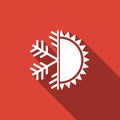 Hot and cold symbol. Sun and snowflake icon isolated with long shadow. Winter and summer symbol Royalty Free Stock Photo