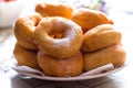 Hot confectioners have just been sentenced and laid out on dishes and sprinkled with powdered sugar.