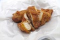 Hot and crispy fried chicken on white paper