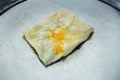 Top view of Fried delicious Roti topping with egg, focus selective Royalty Free Stock Photo