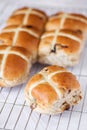 Hot cross buns on a baking tray