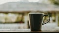 Hot cup of coffee with smoke on the wooden floor in the morning Royalty Free Stock Photo