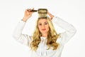 Hot curling brush. Hair care. Hairdresser salon. Professional equipment. Beauty supplies shop. Pretty woman brushing Royalty Free Stock Photo